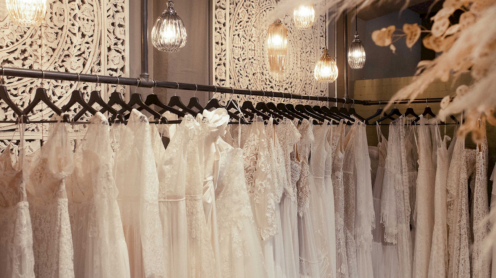 Wedding dresses on dress rack
